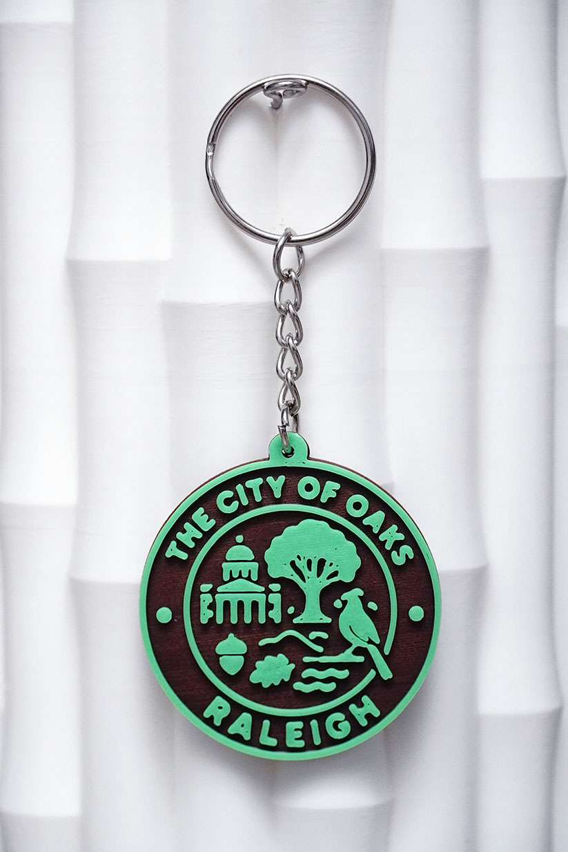 🌳 Raleigh Keychain – The City of Oaks | Brown & Green